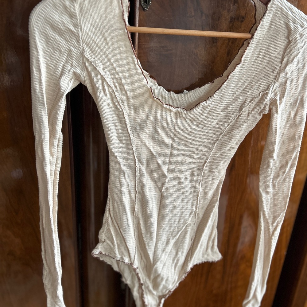 Intimately Free. Cream Long Sleeve Bodysuit